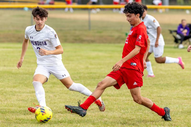 (from left) Gael Garcia (3) of Mendota defends as Adrian Granados (11) of Streator dribbles ball on Saturday, Aug 30, 2025 at the James Street Recreation Area in Streator.