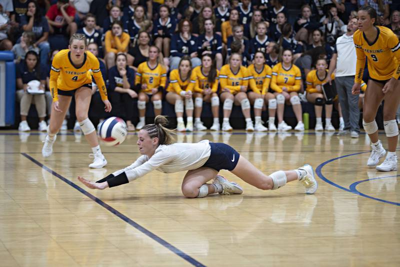 Sterling’s Emma Smith dives for a ball against Newman Thursday, Aug. 25, 2022.