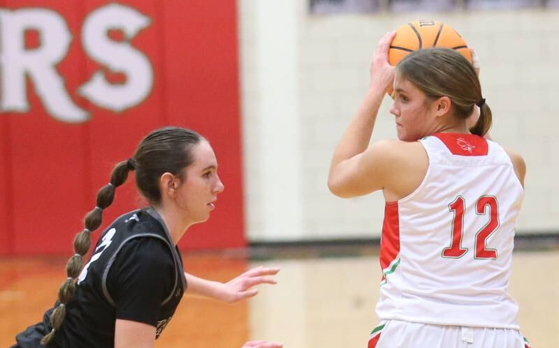 L-P's Phoebe Shetterly looks to pass around Kaneland's Kyra Lilly on Wednesday, Jan. 15, 2025 in Sellett Gymnasium at L-P High School.