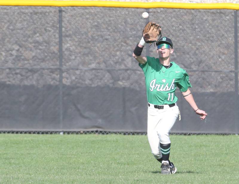 Seneca's Kenny Daggett makes a catch into the sun on Friday, April 19, 2024 at Seneca High School.