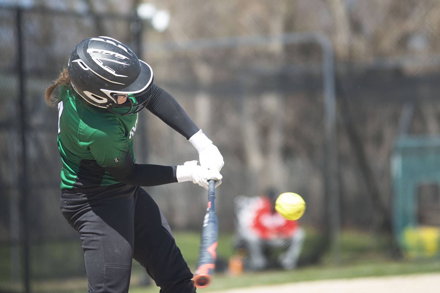 Rock Falls' Olivia Osbourne connects for a single against Ottawa Saturday, April 9, 2022.