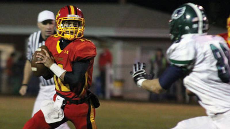 Batavia quarterback Noel Gaspari looks to pass during Friday’s game against Bartlett. (Photo by Wendy Kemp – For the Kane County Chronicle)