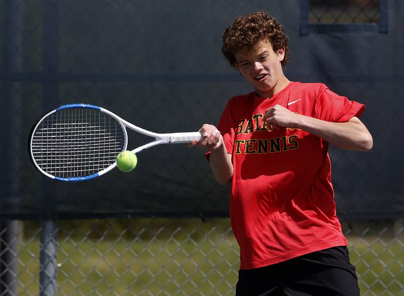 Batavia's Erik Warner returns the ball during an IHSA 2A boys doubles tennis match Thursday, May 25, 2023, at Buffalo Grove High School.