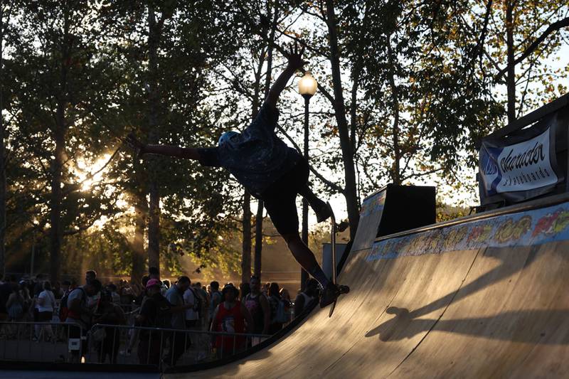 Skateboarders do tricks on a half pipe set up at Riot Fest on Saturday, Sept. 21, 2024 in Chicago.