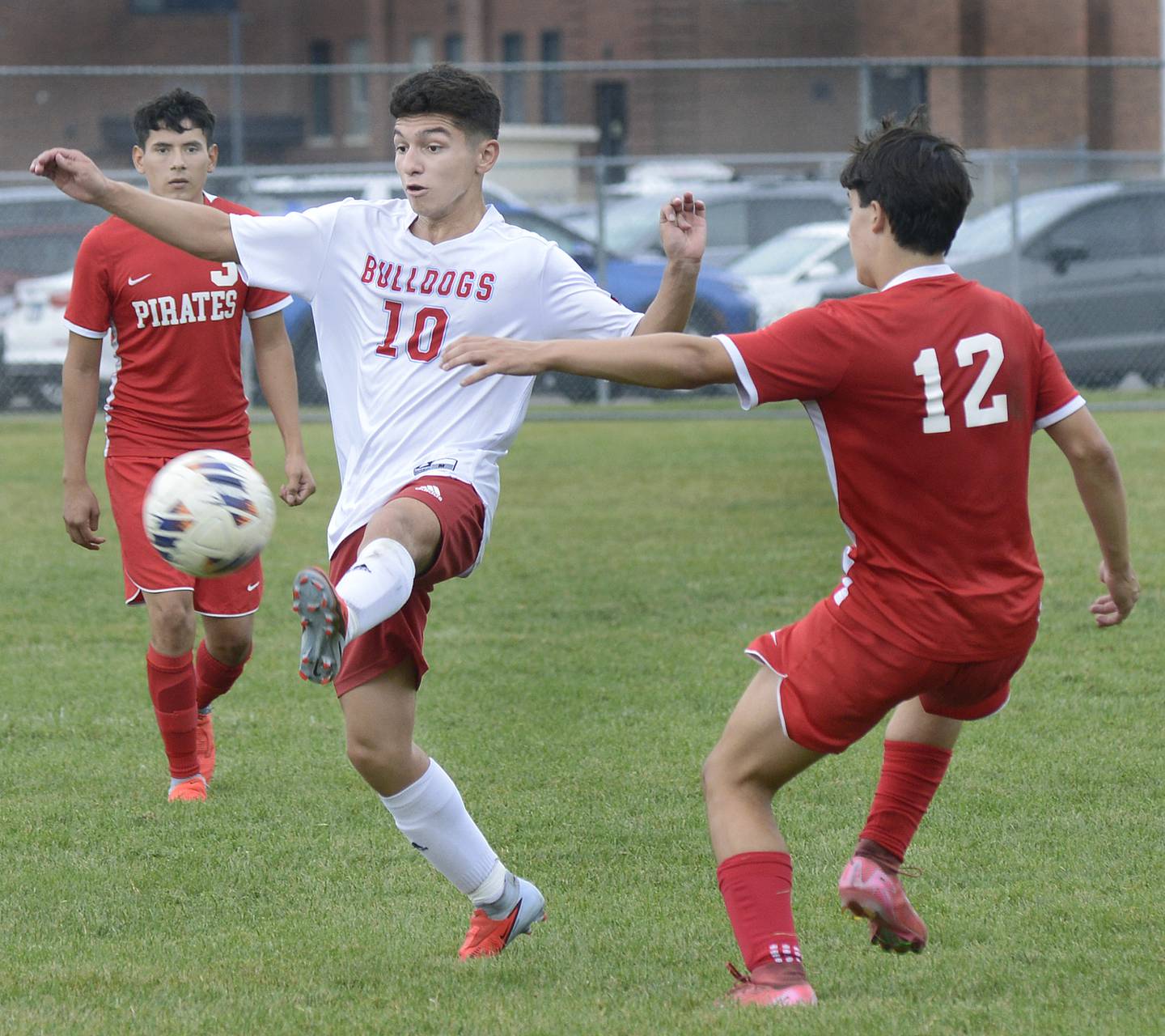 Streator’s Enrique Rodriguez gets a shot past Ottawa’s Luca Fernandez in the 1st half of Saturday’s match at Ottawa.