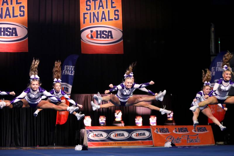 Members of the Wilmington cheerleading team compete in the small team division of the IHSA State Finals on Saturday, Feb. 8, 2025 at Grossinger Motors Arena in Bloomington.