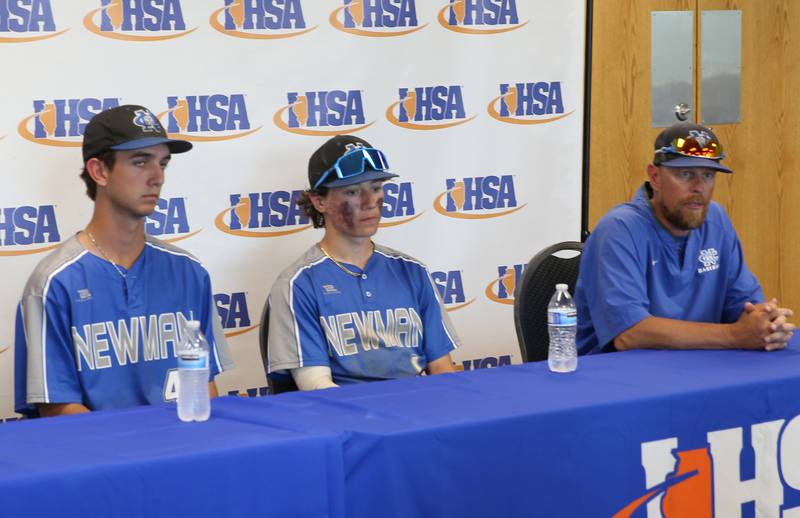 Newman players Kyle Wolfe and Garrett Matznick along with head baseball coach Kenny Koerner interview with the media after the Class 1A State semifinal game on Friday, June 2, 2023 at Dozer Park in Peoria.