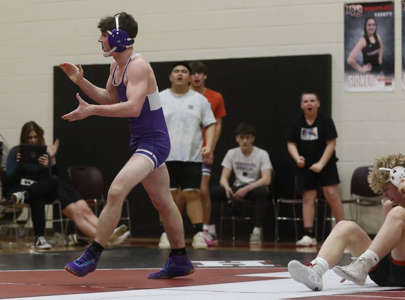 Hampshire's Michael Brannigan celebrates defeating Huntley’s Radic Dvorak in the 157-pound match of a Fox Valley Conference wrestling match Wednesday, Jan. 24, 2024, at Huntley High School.