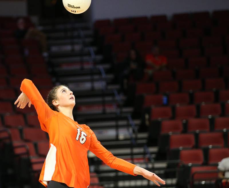 St. Charles East's Julia Ferrandino serves the ball against Mother McAauley in the Class 4A semifinal game on Friday, Nov. 11, 2022 at Redbird Arena in Normal.