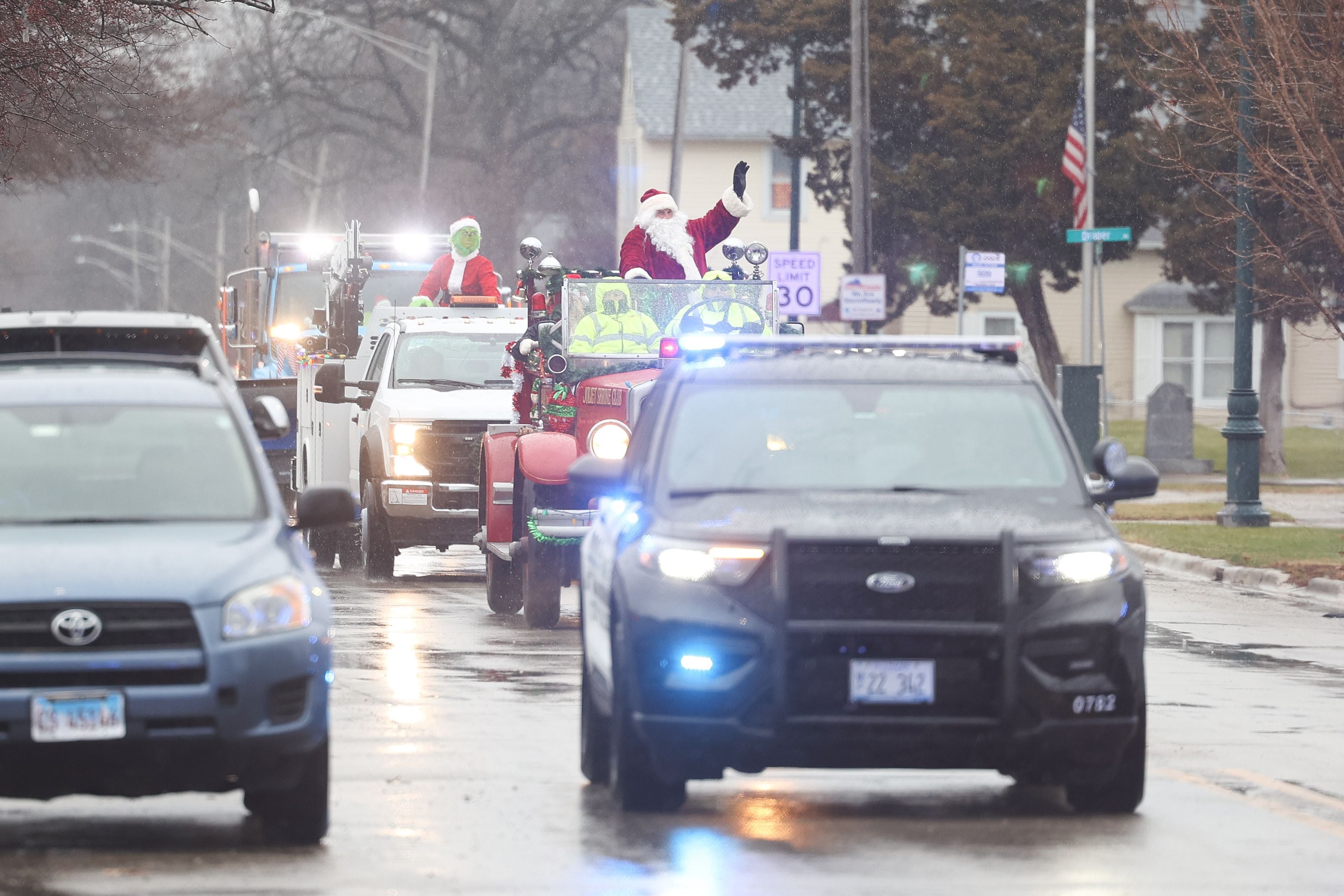 Santa gets a police escort as he passes through Joliet on his way to the North Pole to get ready for Christmas Eve on Saturday, Dec.16th in Joliet.