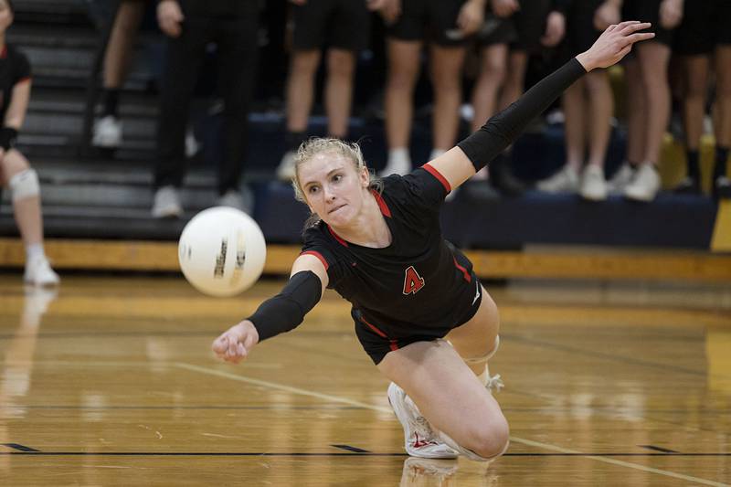 Fulton’s Ava Bowen dives for a ball in game one of their semifinal regional match Wednesday, Oct. 26, 2022 against Polo.