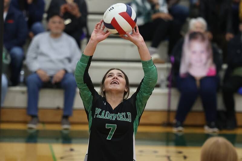 Plainfield Central’s Peyton Facio sets the ball against Joliet Central on Thursday, Oct. 24, 2024 in Plainfield.