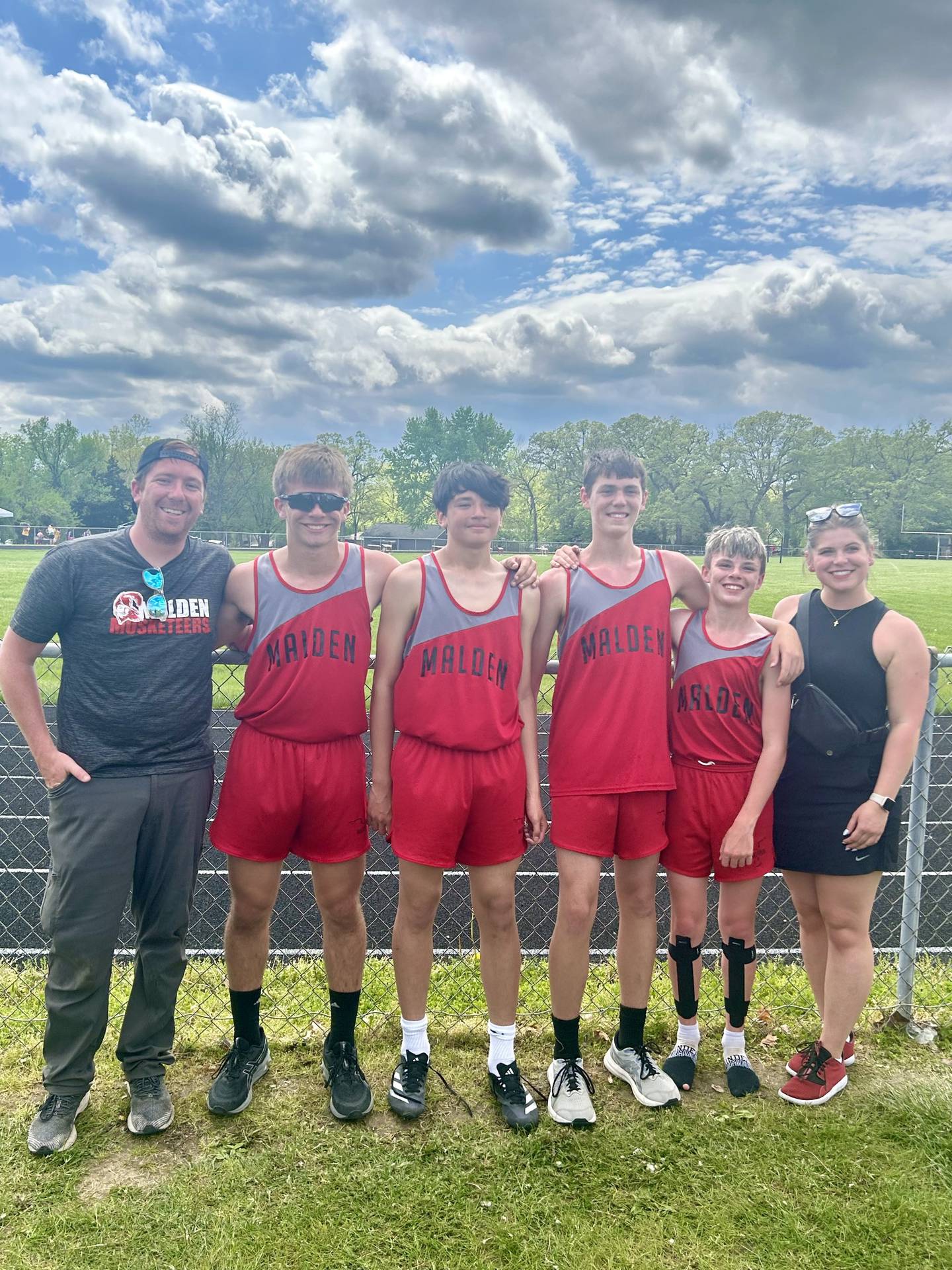 Four Malden Grade School students earned a trip to the IESA state track meet.  Lane Goskusky (shot put), Joseph Perez (100, high jump), Carter Rossler (shot put, discus) and Brady Peach (1600 M). They all four also qualified for the 4x400 relay.  Pictured are head coach Nate Jones (from left), Lane Goskusky, Joseph Perez, Carter Rossler, Brady Peach and assistant coach Kendra Cain.