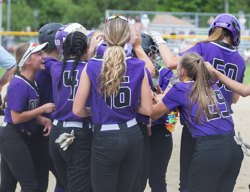 Dixon celebrates Izzi McCommons game tying home run against Sterling Saturday, May 28, 2022.