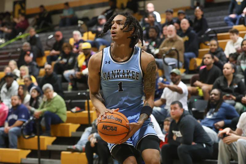 Kankakee’s Lincoln Williams lines up the outside shot against Joliet West on Wednesday, Feb. 18, 2026 in Joliet.