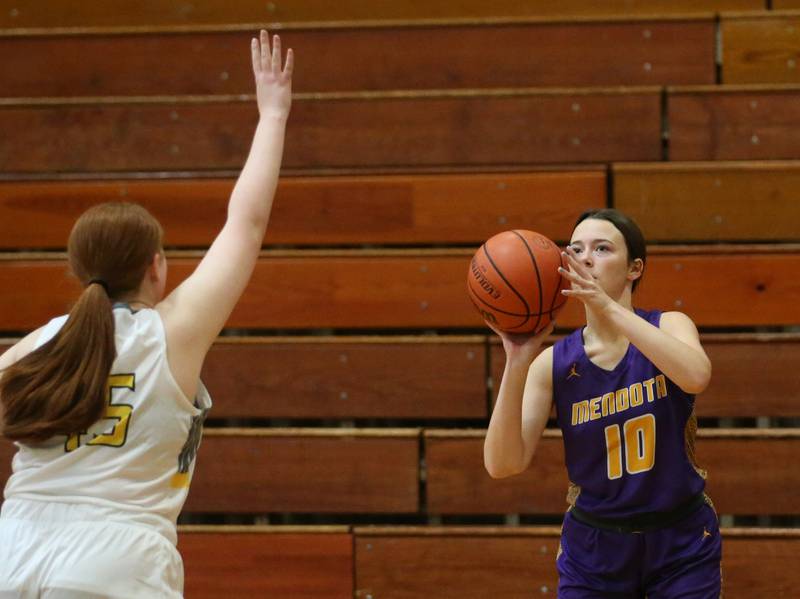 Mendota's Kennedy Knaff shoots a jump shot over Putnam County's Emma Henderson during the Princeton High School Lady Tigers Holiday Tournament on Tuesday, Nov. 14, 2023 in Prouty Gym.