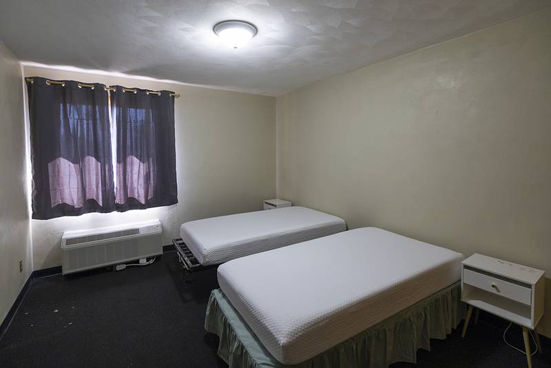 The 42-bed facility has in each room a kitchenette and private bathroom. The home also offers communal spaces for dining, laundry and entertainment.