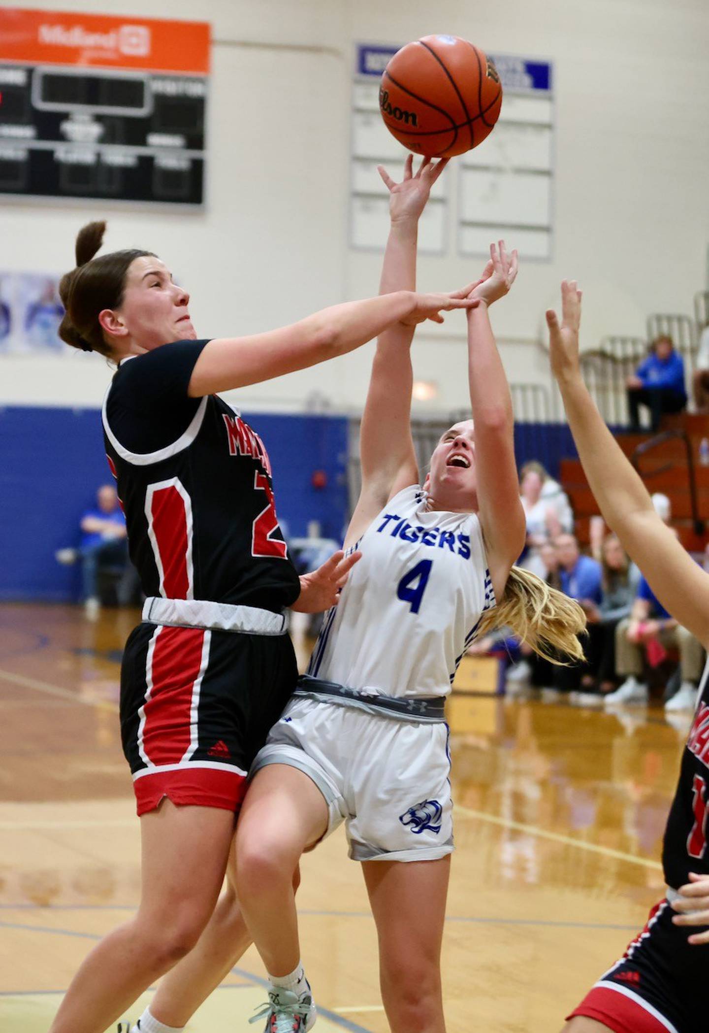 Princeton's Paige Jesse mixes it up with Henry Tuesday night at Prouty Gym.