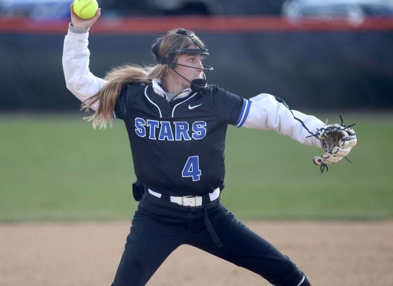 St. Charles North’s Julia Larson throws to first during a game at Wheaton Warrenville South on Thursday, April 14, 2022.
