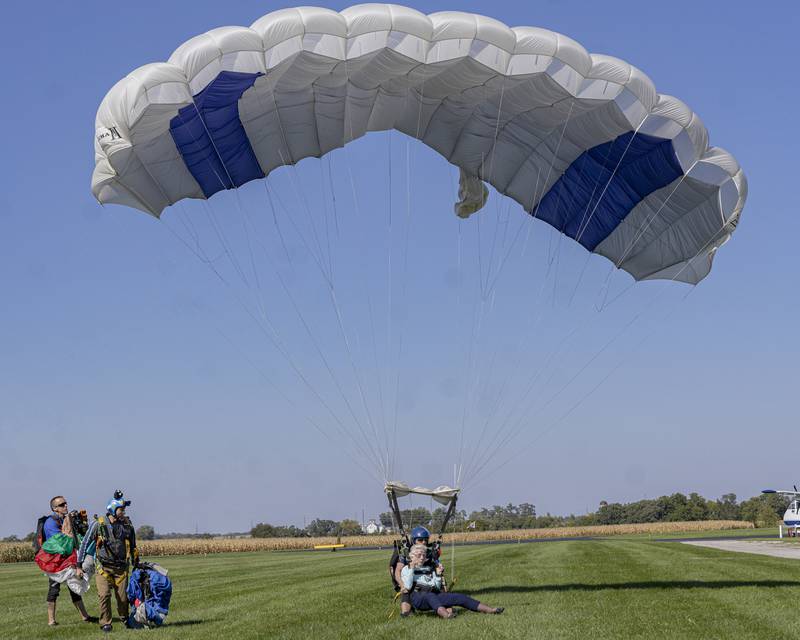 safely slide to a smooth landing, thus sealing the world record breaking attempt for the oldest person to skydive. The record was set at Skydive Chicago on October 1, 2023.