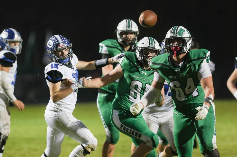 Dwight's Will Anderson, right, focuses on the ball after blocking a punt he would return for a touchdown during Dwight's 43-14 victory over Clifton Central in second round playoffs on Saturday, Nov. 8, 2025.