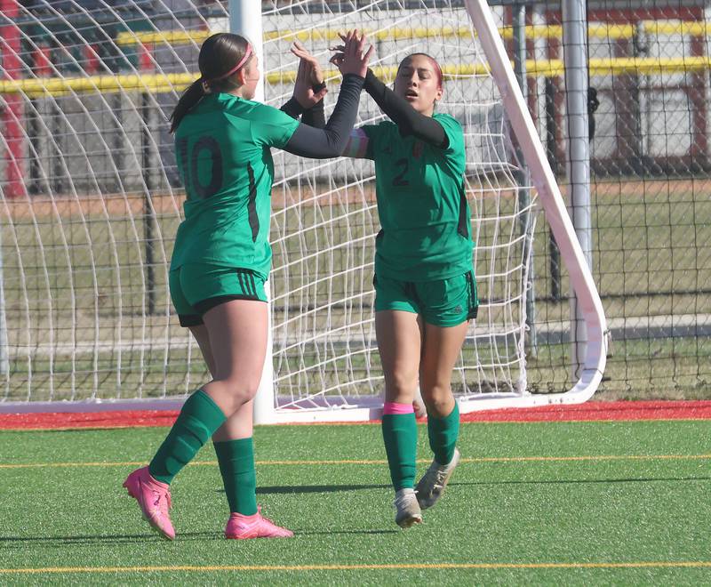 L-P's Kendal Bassett hi-fives teammate Vickie Tejada after scoring a goal against Streator on Friday, March 27, 2026 at the L-P athletic complex in La Salle.