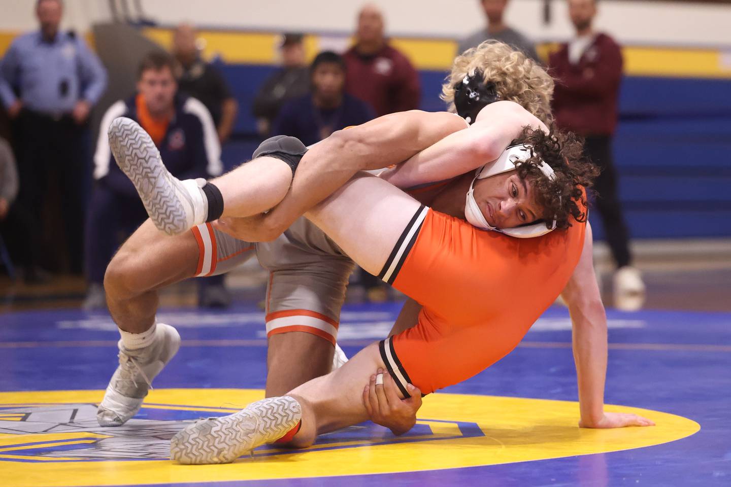 Romeoville’s Mason brings down Minooka’s Hunter Coons for two points in the Class 3A Joliet Central Regional 175 pound Championship match on Saturday, Feb. 3rd 2024 in Joliet.