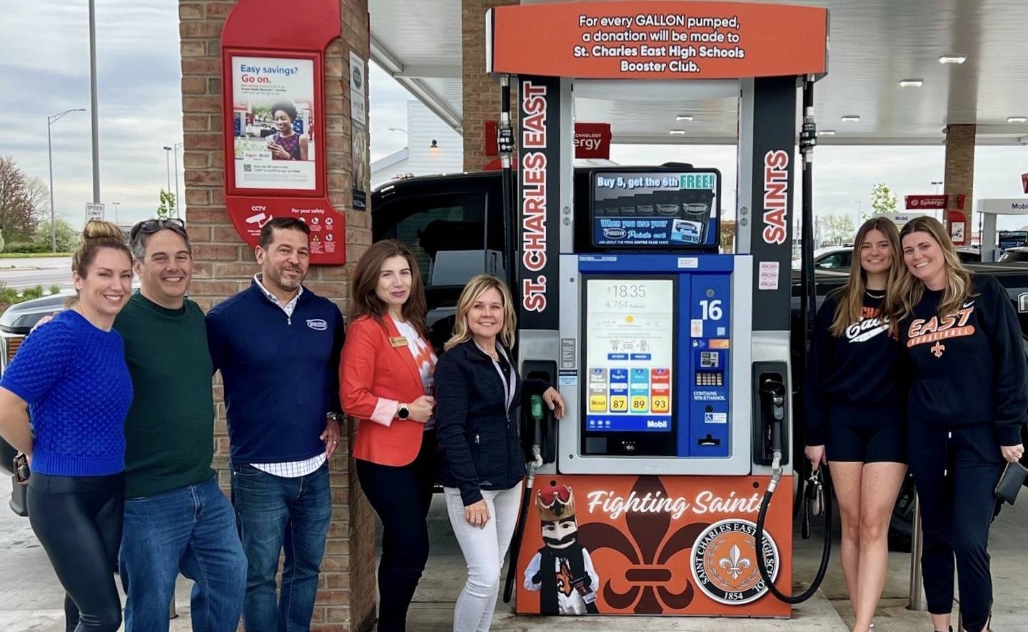 St. Charles city officials and Athletic Booster Club members pose at the Spirit Pump kick-off on Thursday April 18, 2024, at The Pride of Kane County at 3025 E Main St. (From left: North Booster Club Presitent Amy Siotrops, North Booster Club Treasurer Paul Lencioni, Parent Petroleum owner Mario Spina, Alderperson Jayme Muenz, Mayor Lora Vitek, Claire Trask and East Booster Club Vice President Heather Trask)