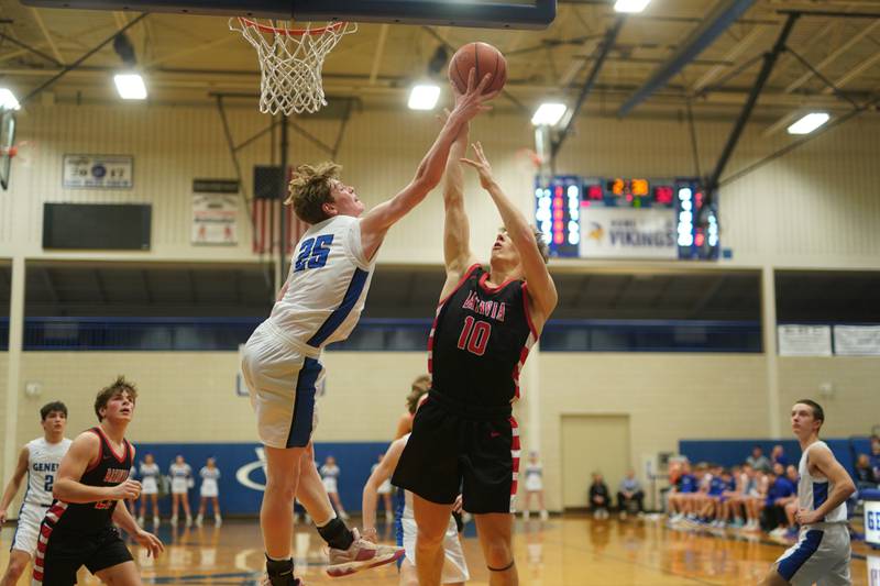 Geneva’s Hudson Kirby (25) blocks a shot by Batavia’s Nate Nazos (10) during a basketball game at Geneva High School on Friday, Dec 15, 2023.