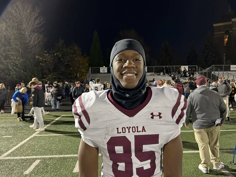 Loyola's Nicholas Arogundade caught two touchdowns Saturday in the Ramblers 41-7 win over St. Ignatius in the Class 8A quarterfinals.