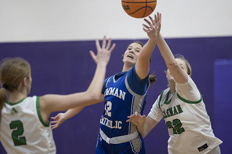 Newman’s Lucy Oetting and Alleman’s Megan Hulke go after a ball Friday, Dec. 26, 2025, at the Duchesses Basketball Christmas Classic.