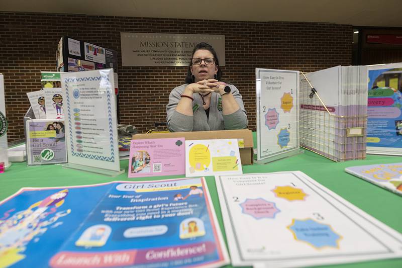 Girl Scouts of America representative Michelle Hicks is looking for volunteers to lead a troop or teach a skill like knitting or crocheting while attending a volunteer fair Thursday, April 2, 2026.