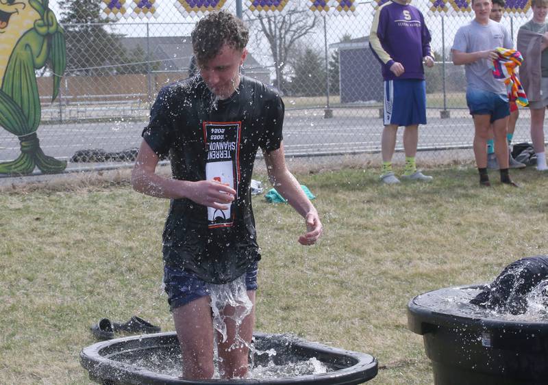Finn Rosengren, a student at Serena High School, stands in a cold bucket of water during the Polar Plunge for Special Olympics on Friday, March 21, 2025 at Serena High School.