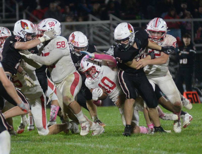 Oregon's Keaton Salsbury (10) fights for yards against Stillman Valley on Friday, Oct. 10, 2025 in Stillman Valley.
