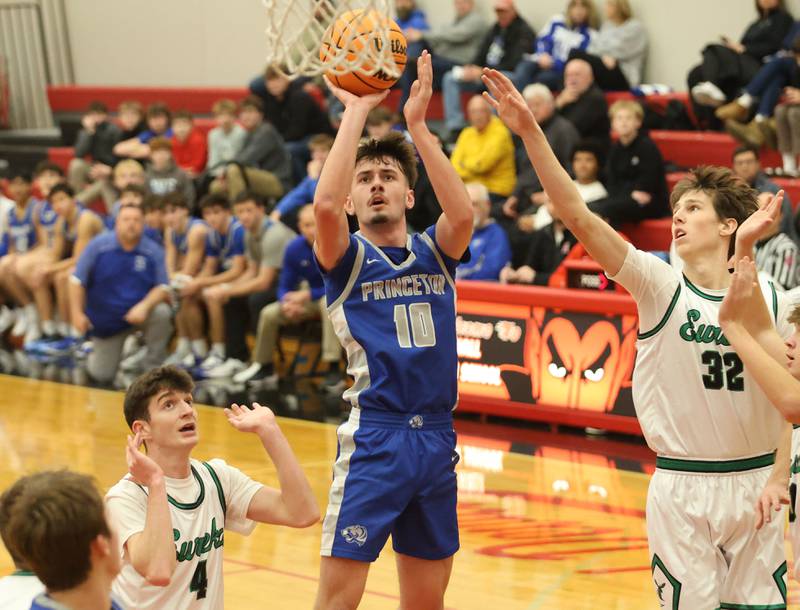 Princeton's Gavin Lanham pulls up in the lane to shoot a jump shot over Eureka's Jack Bluner during the Colmone Classic on Thursday, Dec. 11, 2025 at Hall High School.