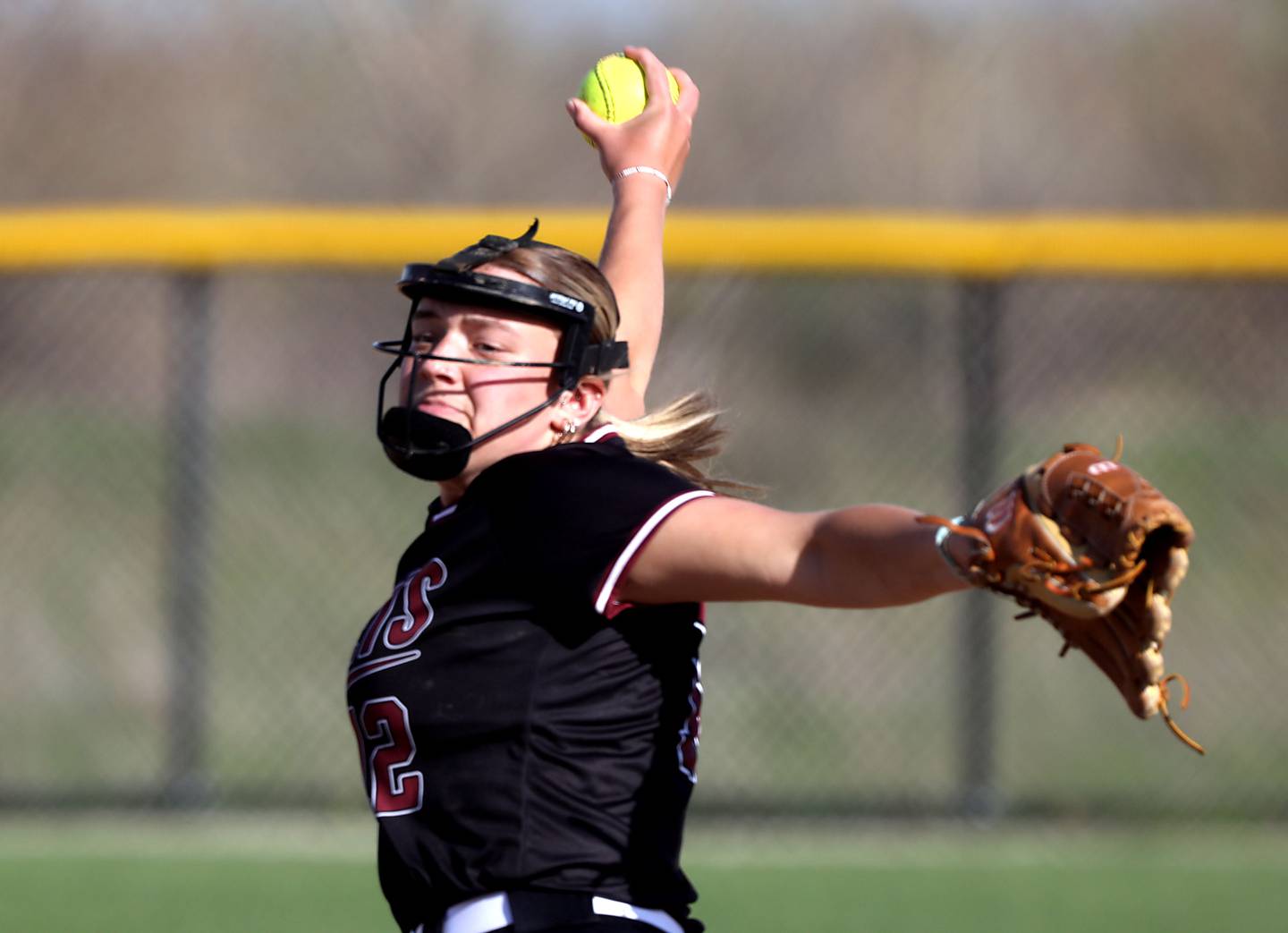 Richmond-Burton's Chase Cooper throws a pitch during a Kishwaukee River Conference softball game against Woodstock North on Thursday, April 16, 2026, at Woodstock North High School.