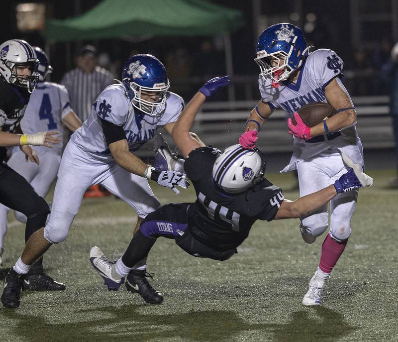 Newman’s Rylan Alvarado is tripped up by El Paso’s Harlin Toillion Saturday, Nov. 8, 2025.