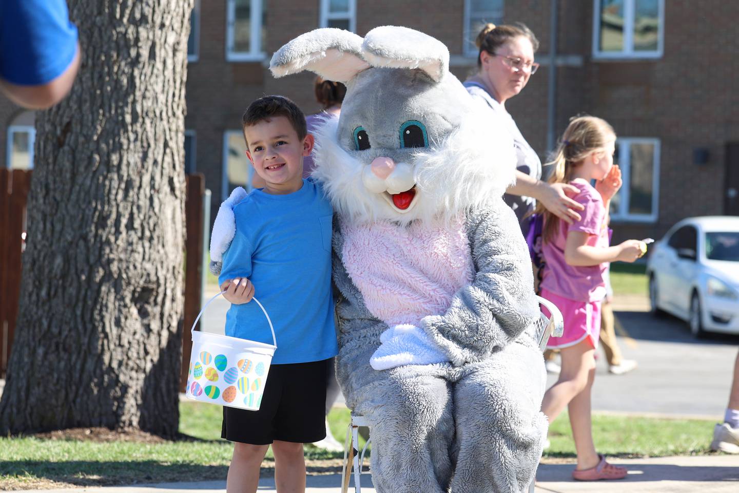 Ryker Lane, 6, of Limestone, poses for a photo with the Easter Bunny during the Riverside Senior Life Easter Egg Hunt hosted at Westwood Trails Assisted Living in Kankakee on Saturday, March 21, 2026.