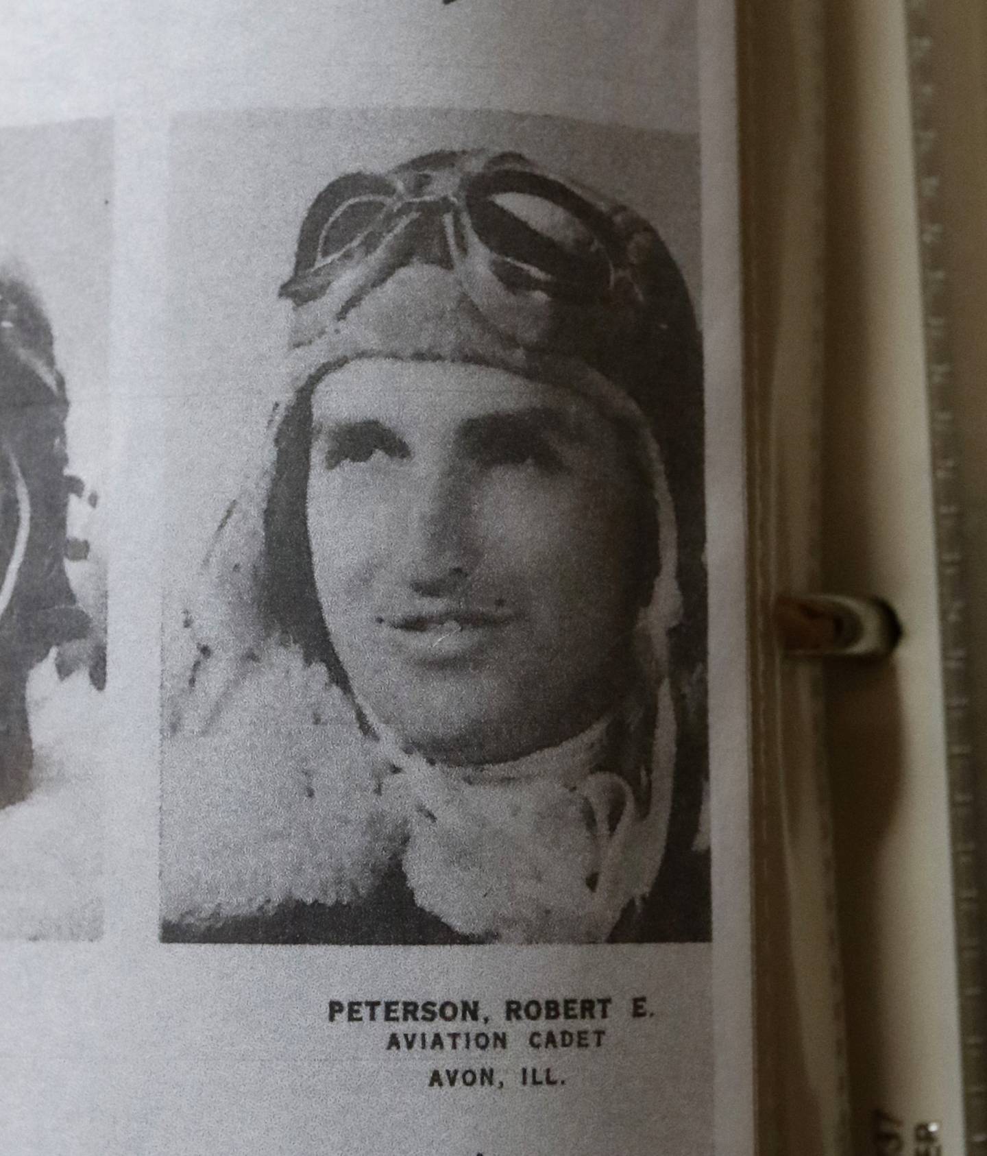 A photograph in a binder of Art Peterson’s father, U.S. Army Air Forces Staff Sgt. Robert E. Peterson. Art Peterson, a retired journalist, wrote a book based on the letters his father wrote to his mother during World War II.