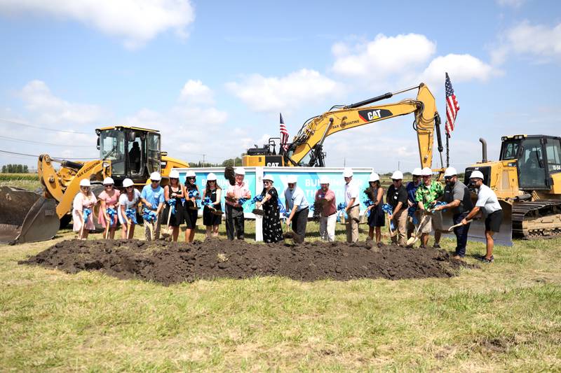 Board members and employees of the Fox Valley Family YMCA ceremoniously break ground during a groundbreaking ceremony for the East Branch of the Fox Valley Family YMCA on Tuesday, Aug. 27, 2024 in Bristol.