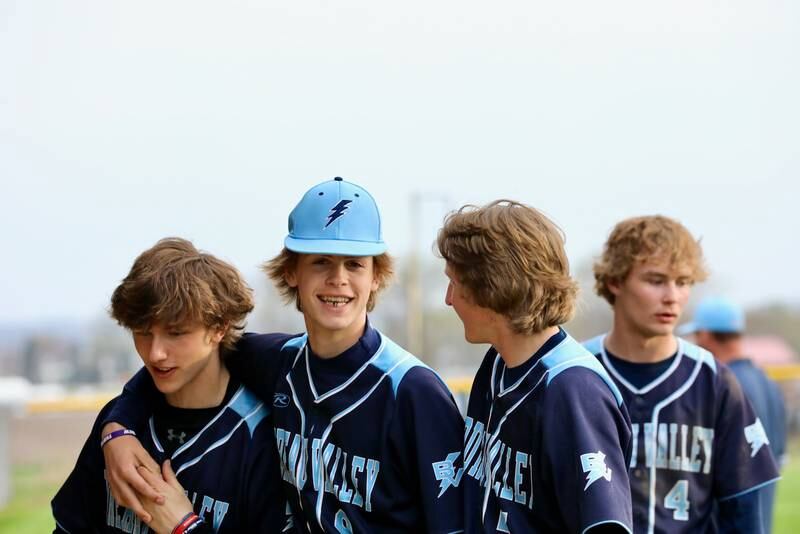The Bureau Valley Storm walk off the field after rallying to defeat St. Bede 5-4 Monday in Manlius.