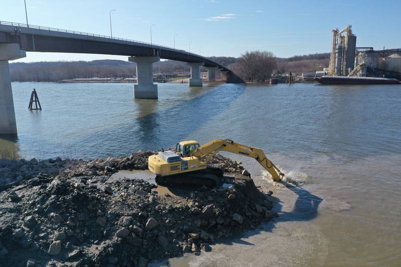 An excavator dredges the harbor at Barto Landing on Wednesday, March 26, 2025 in Spring Valley.