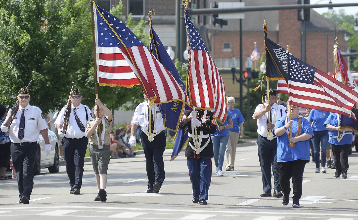 Local veterans groups and Scouts march Monday, May 30, 2022, down Columbus Street in Ottawa during the annual Memorial Day parade.