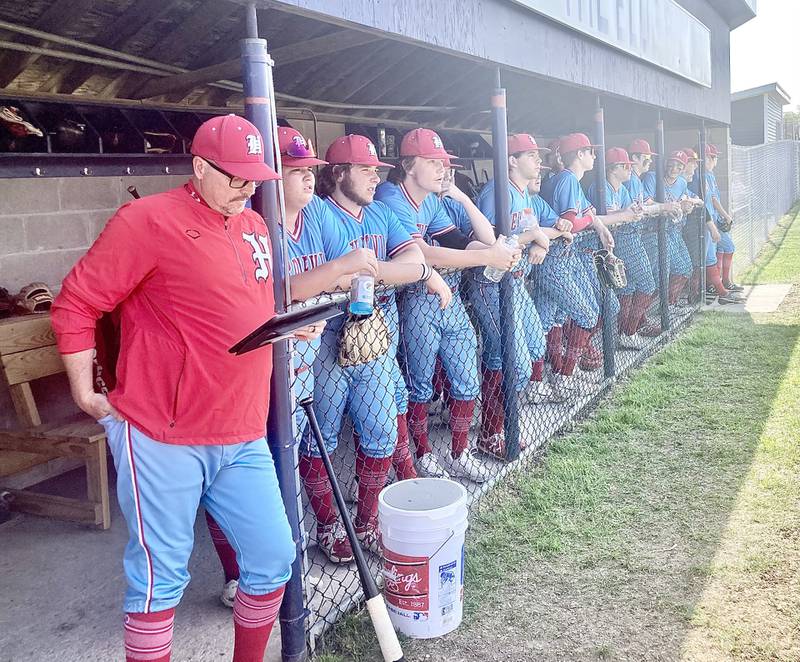 The Hall Red Devils bench watches LVC co-op warm up before Thursday's Class 2A Sectional semifinal game at Knoxville. The Red Devils will face Three Rivers rival Sherrard in Saturday's championship game at 11 am.