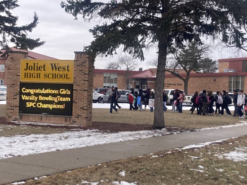 Students at Joliet West High School begin walking out of school around 1 p.m. as they get ready to participate in a march against Immigration and Customs Enforcement actions on Friday, Feb. 6, 2026.