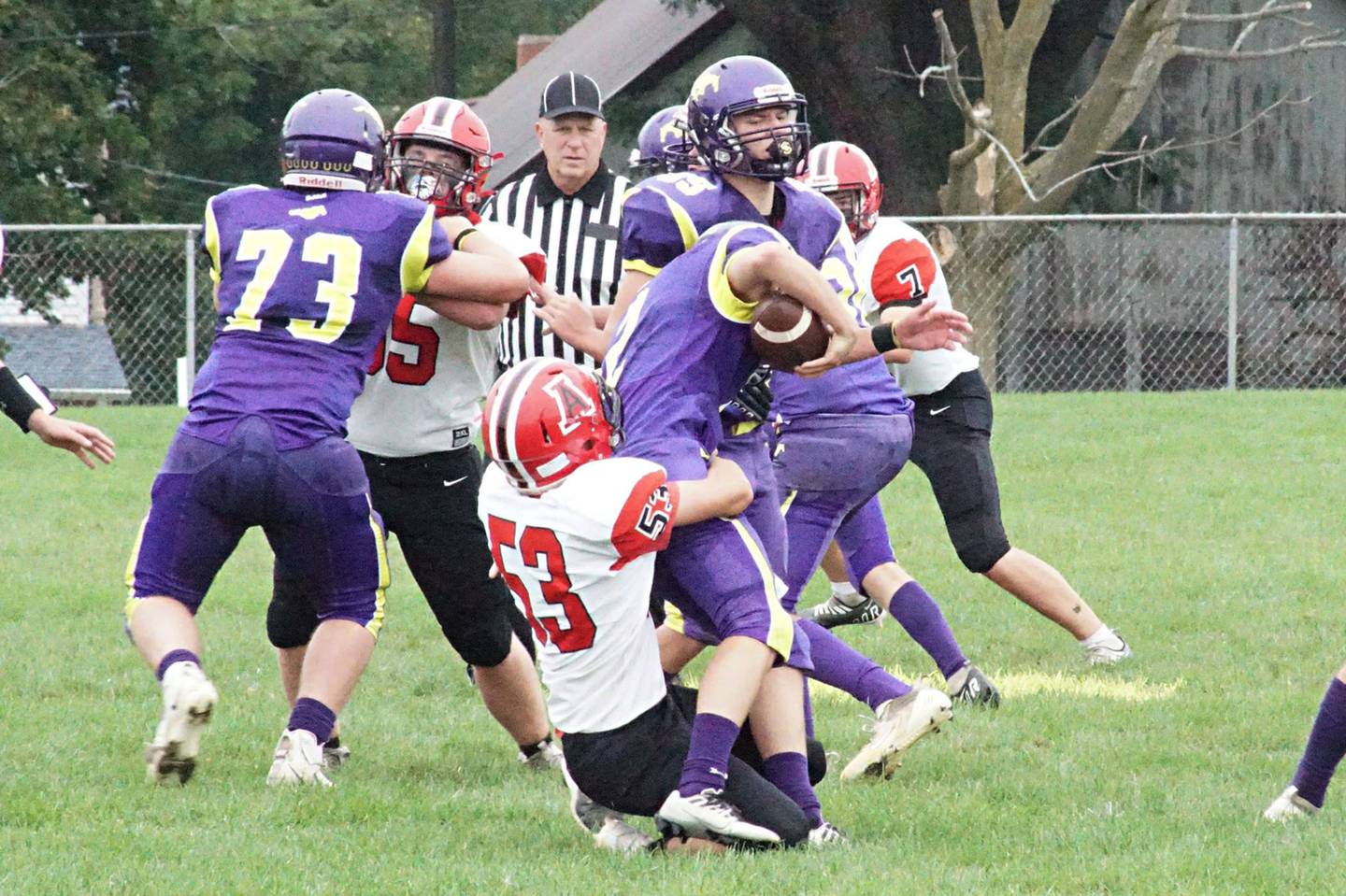 Amboy's Austin Health gets a sack Saturday, Sept. 24, 2022 against Orangeville.