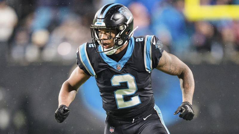 Former Carolina Panthers wide receiver DJ Moore plays against the Atlanta Falcons during the 2022 season. Moore, who the Bears acquired Friday via trade, carries a $20.1 million cap hit for the 2023 season.