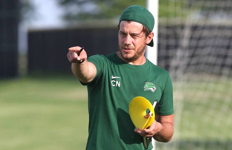 New Kishwaukee College mens soccer coach Colby Newquist runs practice Monday, June 13, 2022, at the college in Malta.