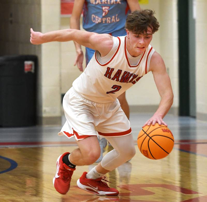 Oregon's Cooper Johnson steals the ball against Woodstock Marian at the Oregon Boys Basketball Thanksgiving Tournament on Wednesday, Nov. 26, 2025 at the Blackhawk Center in Oregon.