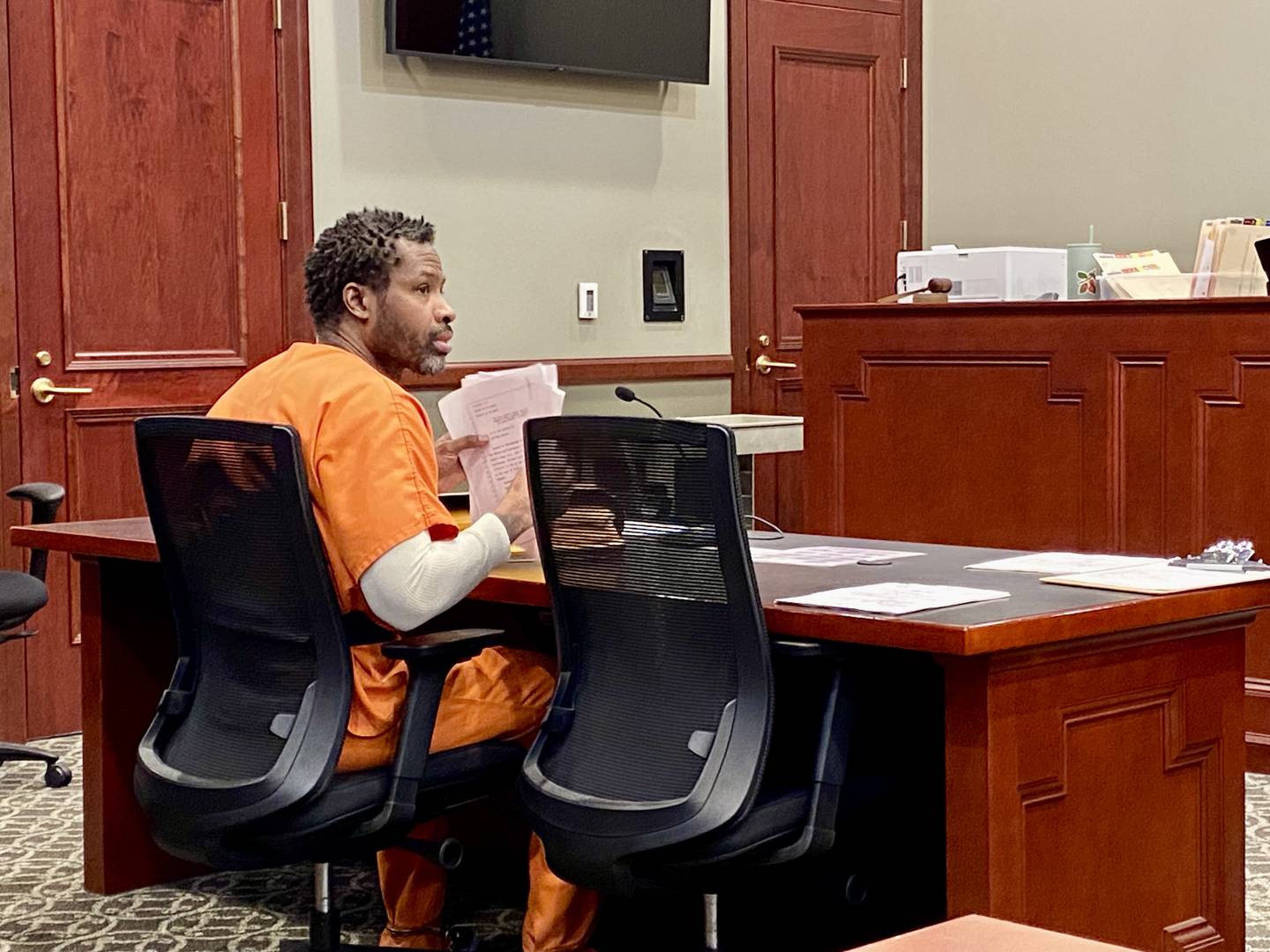 Matthew L. Martin, 44, of Chicago, prepares paperwork at the start of a pretrial status hearing on Wednesday, April 2, 2025, at the DeKalb County Courthouse in Sycamore. Martin is charged in a July 2024 DeKalb bank robbery, and is expected to represent himself when trial convenes April 7.